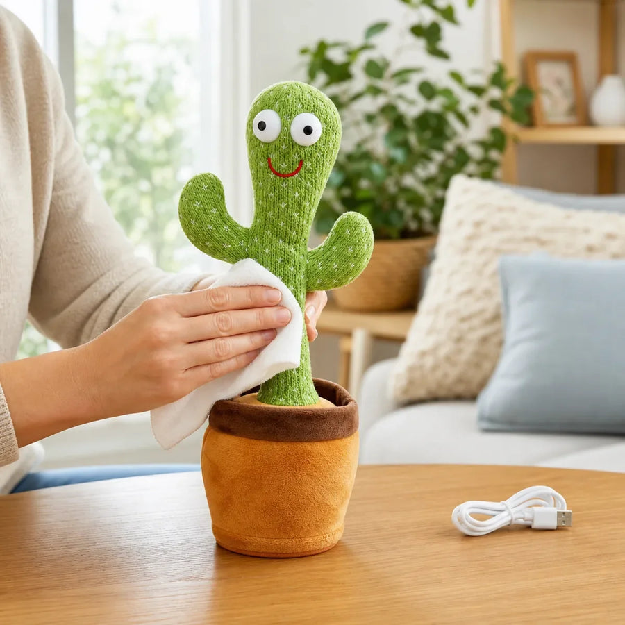 Adult spot cleaning a dancing cactus toy with a soft cloth